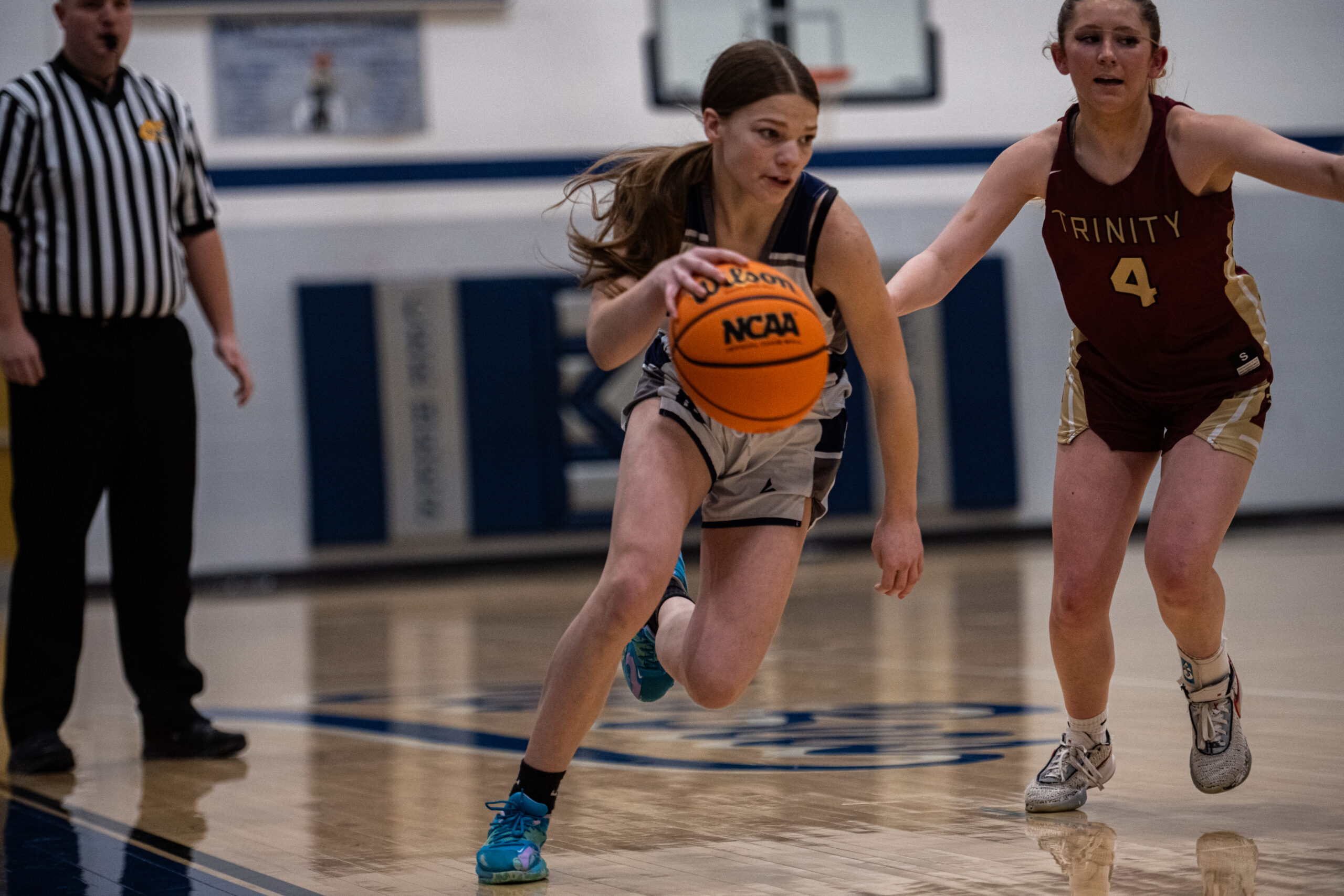 Trinity Christian races past Clay-Battelle 49-30